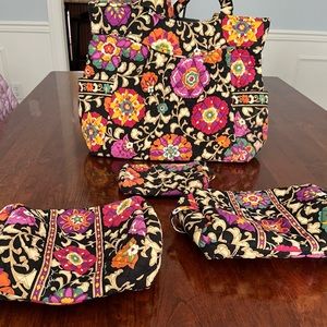 Vera Bradley shoulder bag, 2 large cosmetic bags and 1 small pouch.